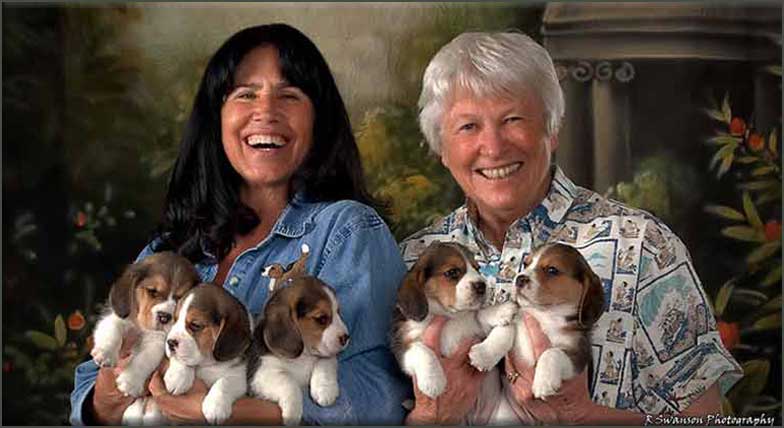 Linda and Sandi with puppies